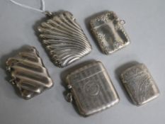 Five assorted silver vesta cases.