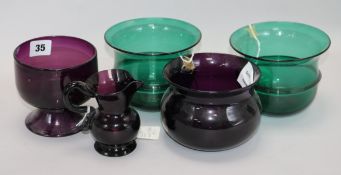 Four assorted Victorian coloured glass finger bowls and a jug