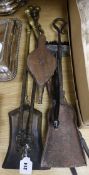 A set of three Victorian fire brasses, bellows and sundry irons