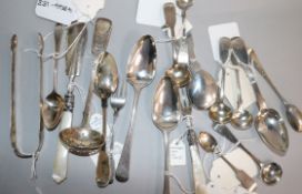 Nineteen assorted small items of flatware including, caddy spoon, sugar tongs, butter knife and