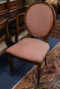 A set of eight late 19th century French walnut and rosewood dining chairs