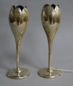 A pair of early 20th century silver tulip shaped spill vases, marks rubbed on one, 17.3cm.