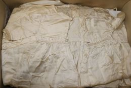 A small collection of ivory silk and linen children's clothing, Christening gowns, etc.