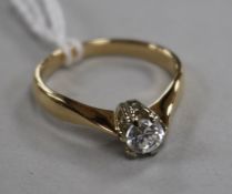 A gold and solitaire diamond ring, size L.