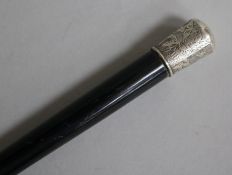 A late Victorian silver mounted ebonised baton, 52cm.