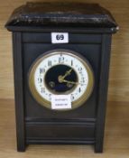 A Victorian black slate mantel clock