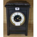 A Victorian black slate mantel clock