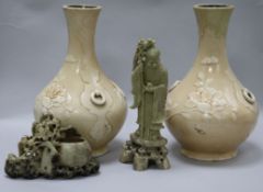 A pair of Bretby Chinese style vases, 29cm and two Chinese soapstone carvings