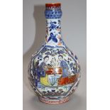 A 19th century Chinese blue and white vase, with clobbered decoration 24cm.