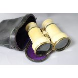 A cased pair of Victorian ivory binoculars