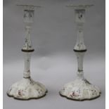 A pair of 18th century English enamel candlesticks 26cm.