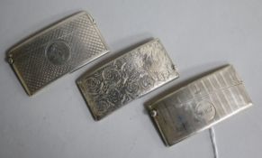 Three assorted silver card cases, of curved form, all approx. 81mm.