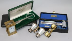 A pair of opera glasses, a draughtsman's set, a cigar cutter etc