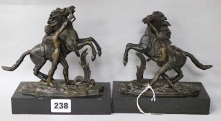 A pair of bronze Marley horse groups, on slate plinths, 16cm