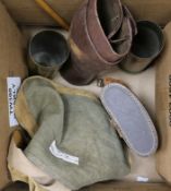 A British WWI collar box, a haversack and gaiters, two WW1 shell cases and a swagger stick