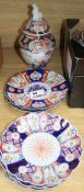 Six Imari plates, 21cm and a vase and cover, 27cm