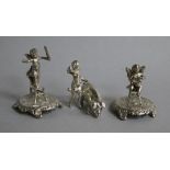 Three late 109th/early 20th century continental silver miniature cherub groups, two with chairs