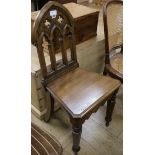 A Victorian oak hall chair