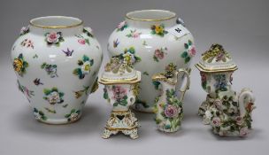 A pair of continental porcelain floral encrusted vases, 18cm, a pair of pot pourri vases, a jug