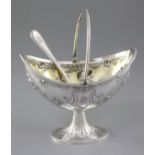 A Victorian silver swing handled sugar basket and sifter spoon, by Martin, Hall & Co, basket