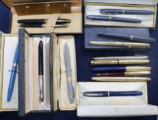 A group of Sheaffer fountain pens and pencils