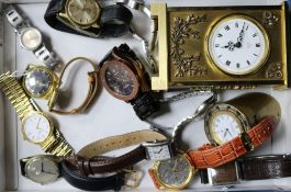 Twelve assorted wrist watches including Longines, Raymond Weil and Helvetia, a carriage clock and