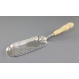 An Edwardian ivory handled silver crumb scoop, by Barker Brothers, hallmarked for Chester 1908, with