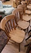 A set of four beech kitchen chairs