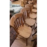 A set of four beech kitchen chairs