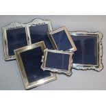 Five assorted modern silver photograph frames, including one double, largest 21.9cm.