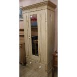 An Edwardian pine wardrobe, W.96cm