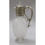 A Victorian silver plated and cut glass claret jug