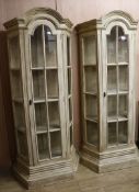 A pair of modern display cabinets, with antique cream finish, W.86cm