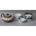 A late 18th century blue and white porcelain pickle dish, two blue and white teabowls, a saucer