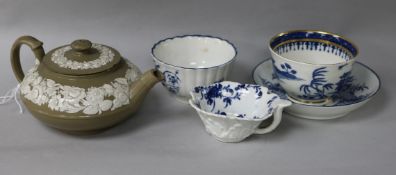 A late 18th century blue and white porcelain pickle dish, two blue and white teabowls, a saucer