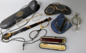 A group of assorted spectacles, etc.