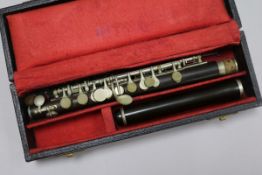 A cased Excelsior piccolo