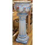 A pottery jardiniere on pedestal