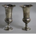 A pair of Edwardian silver spill vases by William Comyns, London, 1907, loaded, 12.8cm.