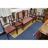 An Edwardian satinwood banded mahogany salon suite