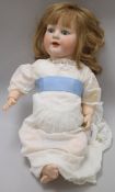 A Dressel 'Jutta - Baby' bisque-headed doll, number 1922, jointed composition body, sleeping eyes,