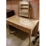 A Victorian pine two drawer dressing table W.106cm