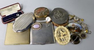 A silver cigarette case and a group of items including an ivory brooch and jewellery.