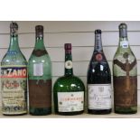 Five oversize bottles of spirits and wines, all empty, largest 51cm