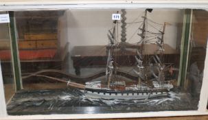 A scratchbuilt waterline model of a three masted barque, in glazed case width 93cm height 49cm