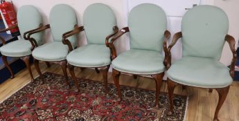 A set of eight George I style walnut dining chairs
