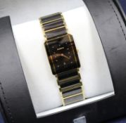 A gentleman's Rado quartz wrist watch, with boxes.