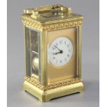 An Edwardian hour repeating gilt brass carriage clock, 13.5cm