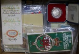 A collection of Queen Elizabeth II proof coin sets (list available)