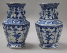 A pair of Chinese blue and white hexagonal vases, 19th century, 20.5cm (a.f.)